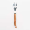 Laguiole olive wood cheese fork on a white background