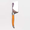 Orange Laguiole cheese cutter on a white background