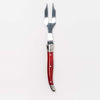Cranberry Laguiole cheese fork on a white background