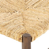 Close up of rush seat on wood 'Largo' dining chair in russet mango by four hands furniture on a white background
