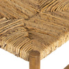 Close up of rush seat on Light wood 'Largo' dining chair in sun-dried mango by four hands furniture on a white background