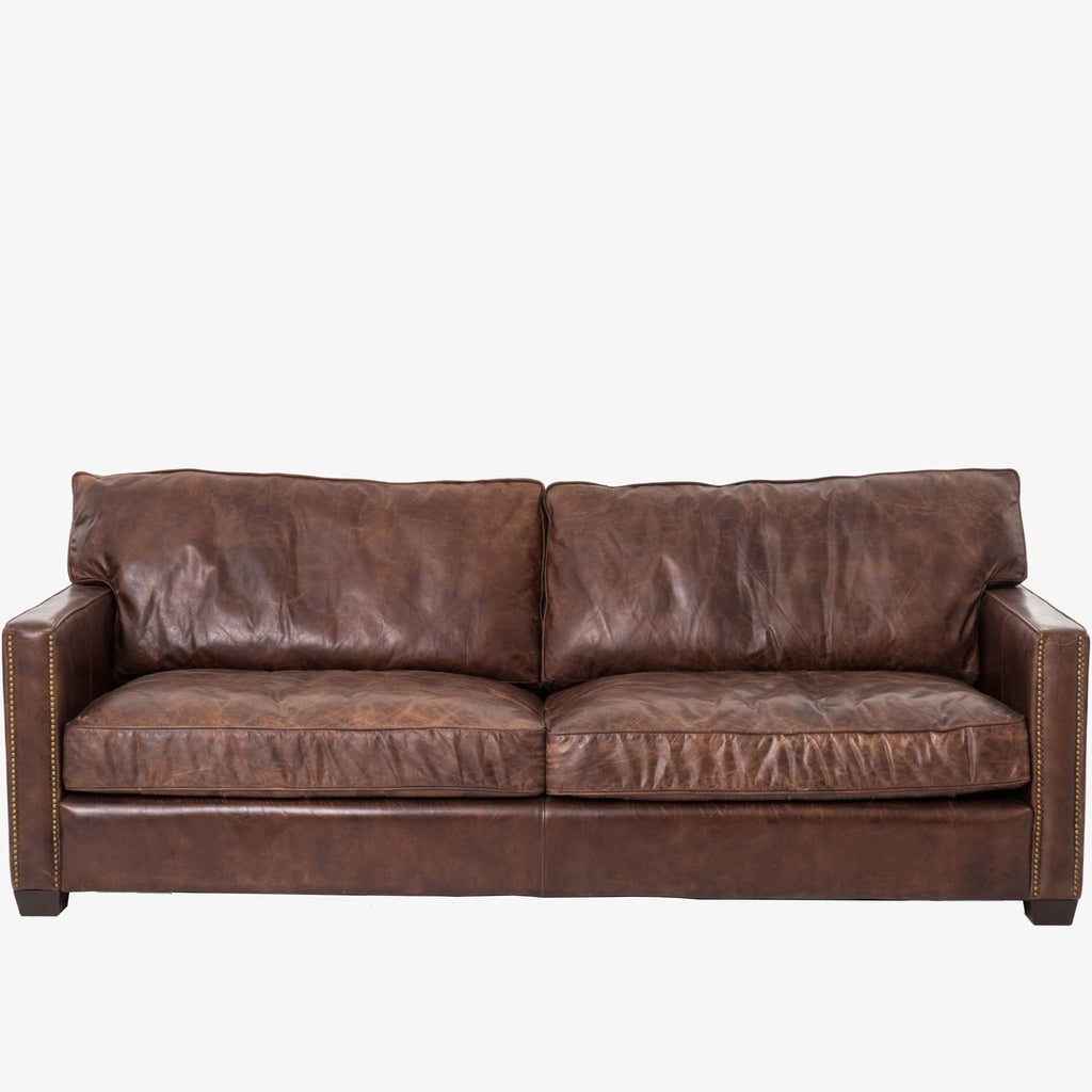 Four hands brand brown leather Larkin 88 inch sofa on a white background