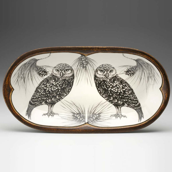Laura Zindel burrowing owl serving dish on a grey background