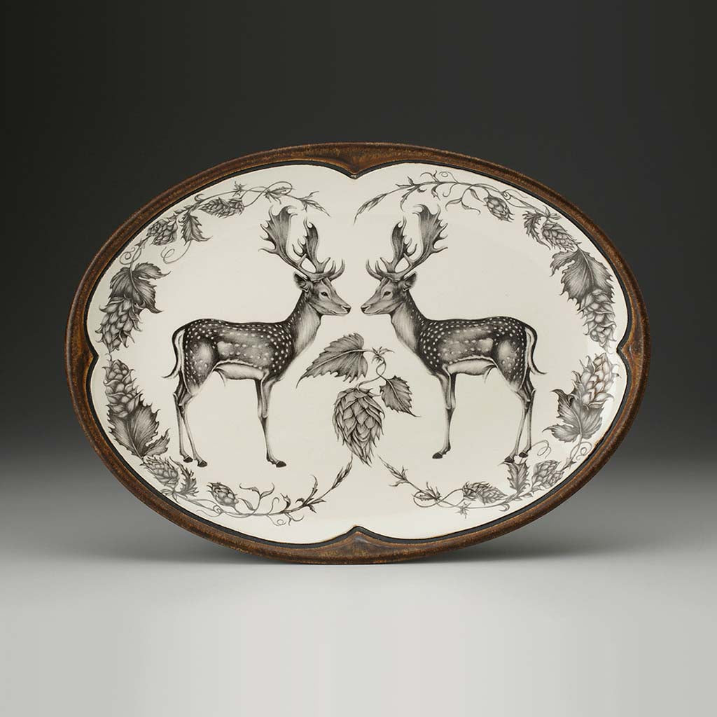 Laura Zindel fallow buck serving dish on a grey background