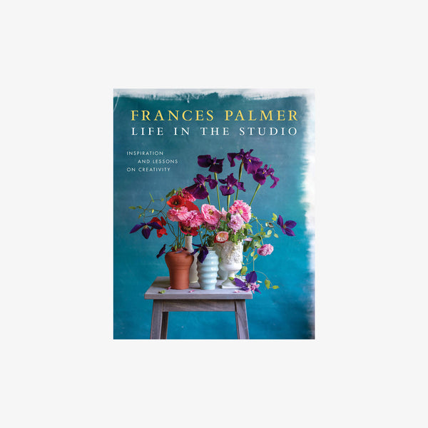 Blue front cover of book 'Life in the Studio: Inspiration and Lessons on Creativity' by Frances Palmer