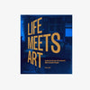 Blue cover of book titled 'life meets art' with yellow letters on a white background