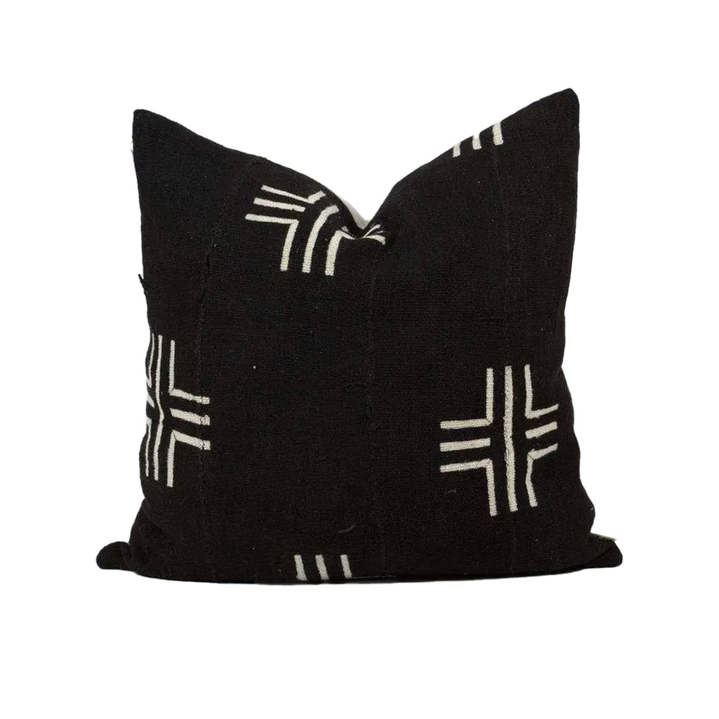 Black mud-cloth throw pillow on a white background