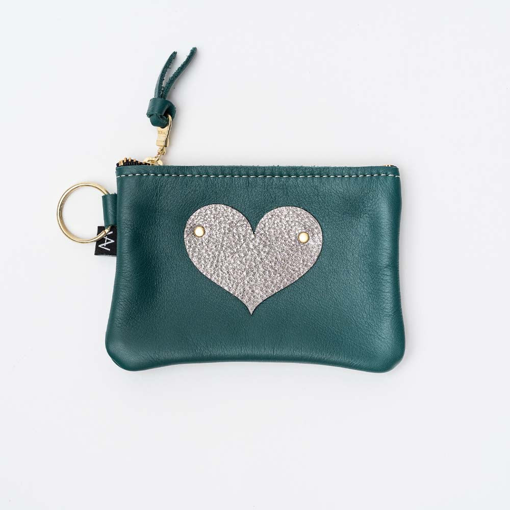 Small zippered green leather pouch with silver heart appliqué