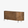 Curved wood 'Lunas' sideboard with small steel feet  by four hands furniture on a white background