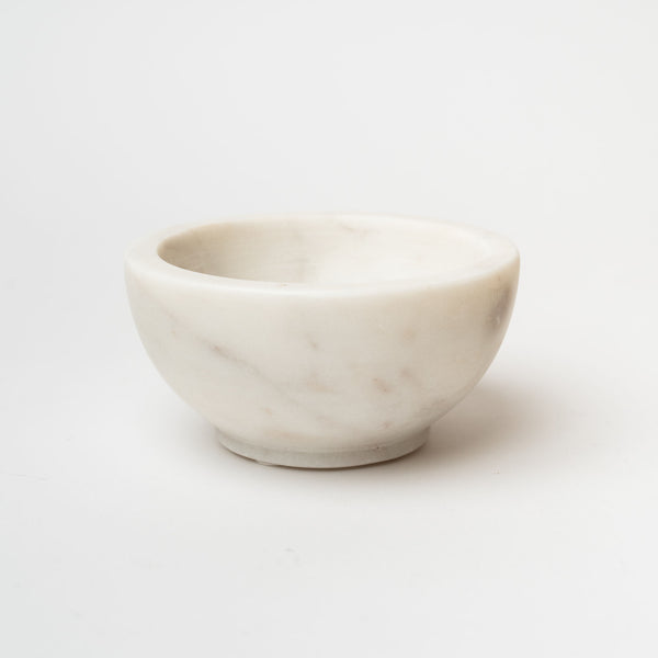 White marble bowl on a white background
