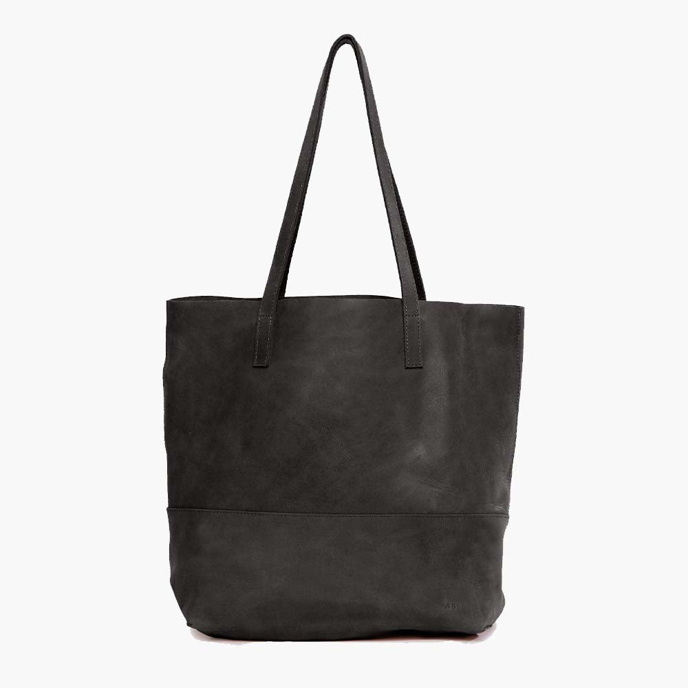 Able brand Mamuye tote in black leather on a white background