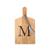 Monogramed maple cheese board with letter 'M' engraved and a stainless cheese knife on a white background