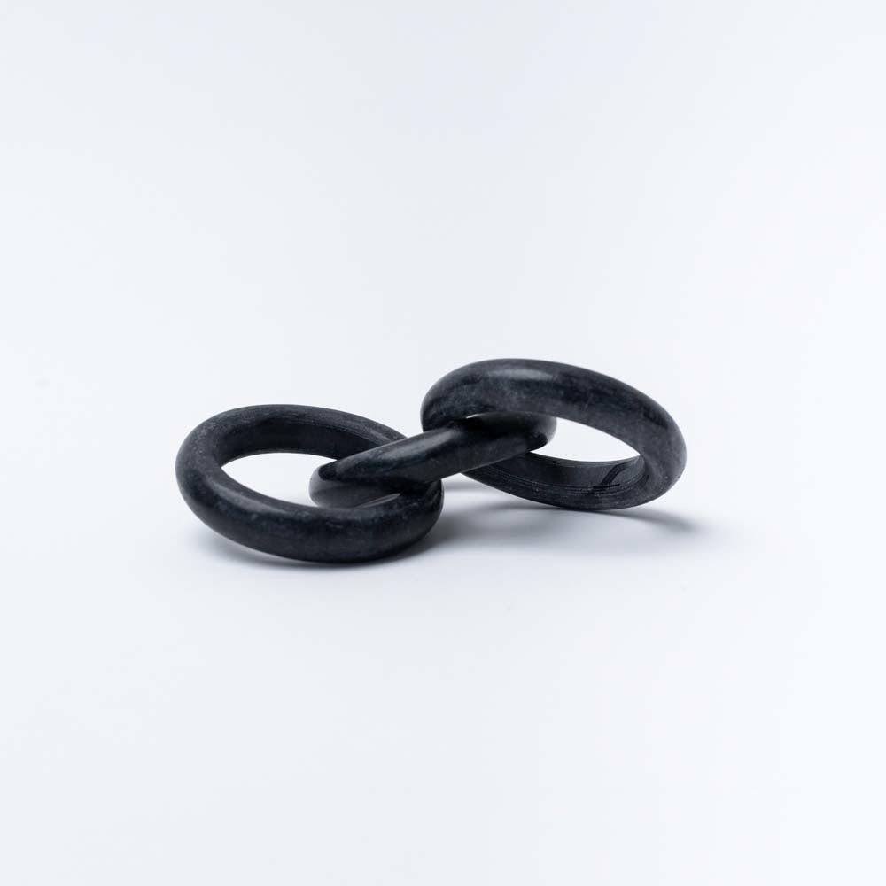 Black Marble Circle Chain Décor on a white background