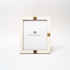 White bone inlay picture frame with gold accents on a white background