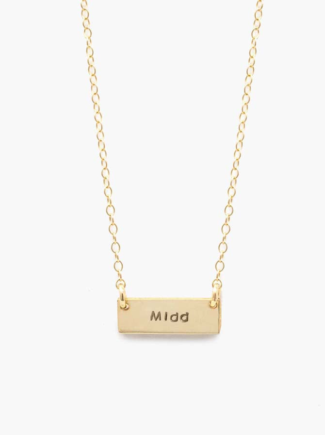 Middlebury College necklace in 14 carat gold fill on a white background