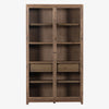 Four hands furniture brand Millie oak cabinet with glass doors and four shelves and interior drawer on a white background