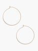 Able brand Minka thin hoop earrings in 14 carat gold fill on a white background