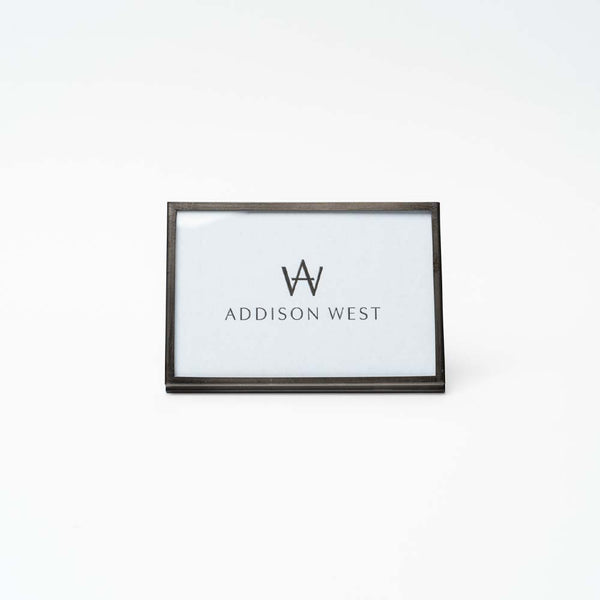 Metal easel style 4x6 picture frame on a white background 