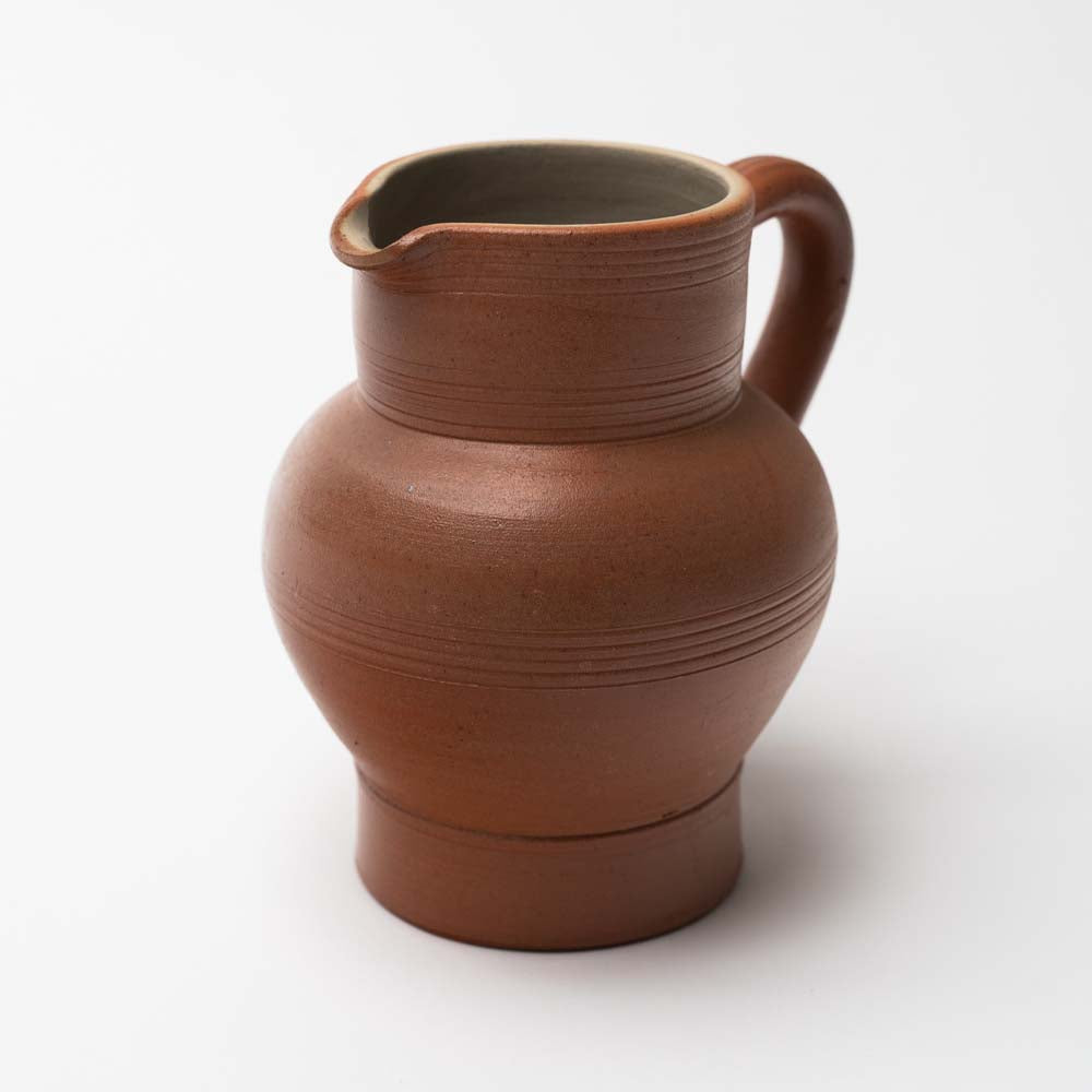 Poterie Renault pottery brown water pitcher on a white background