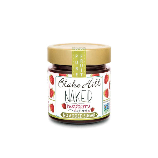 Jar of Blake Hill naked raspberry spread on a white background