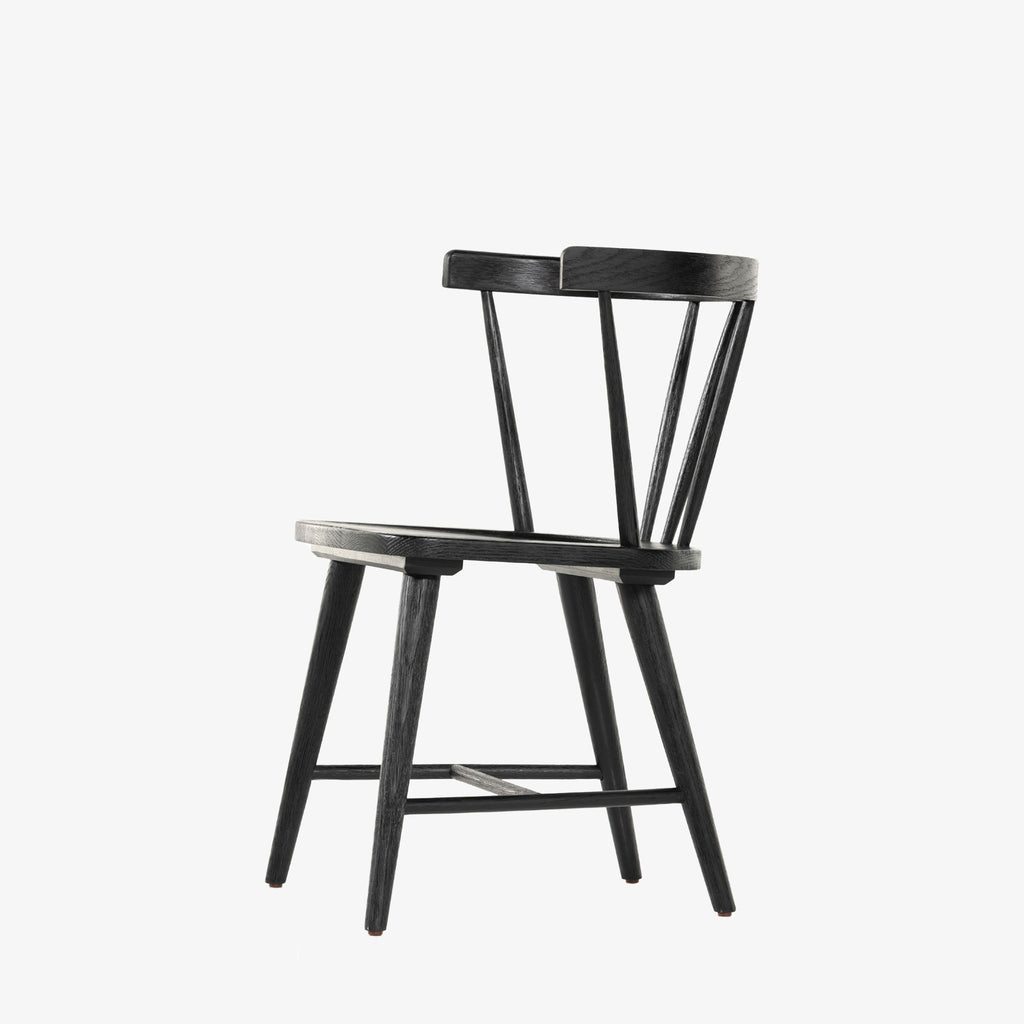 Black 'Naples' Windsor style dining chair with wrap around back and round tenoned back by four hands furniture on a white background