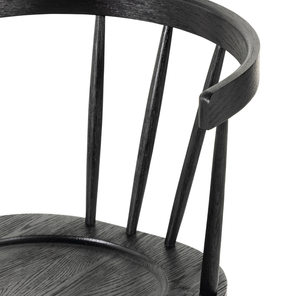 Black 'Naples' Windsor style dining chair with wrap around back and round tenoned back by four hands furniture on a white background