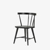 Black 'Naples' Windsor style dining chair with wrap around back and round tenoned back by four hands furniture on a white background