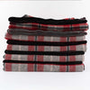 Stack of Johnson Woolen Mills wool blanket in grey and red check print on a white background