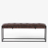 Four hands brand Oxford bench with iron frame and brown leather top on a white background  