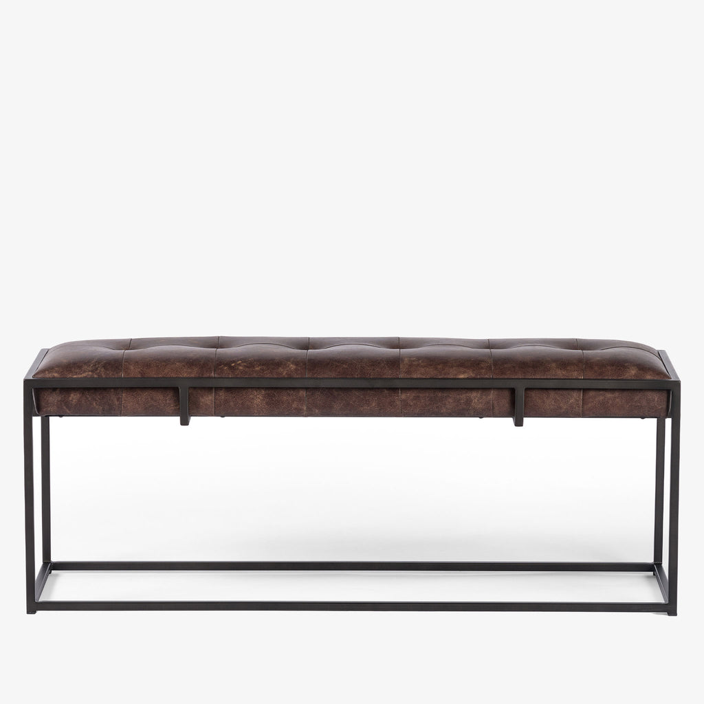 Four hands brand Oxford bench with iron frame and brown leather top on a white background  