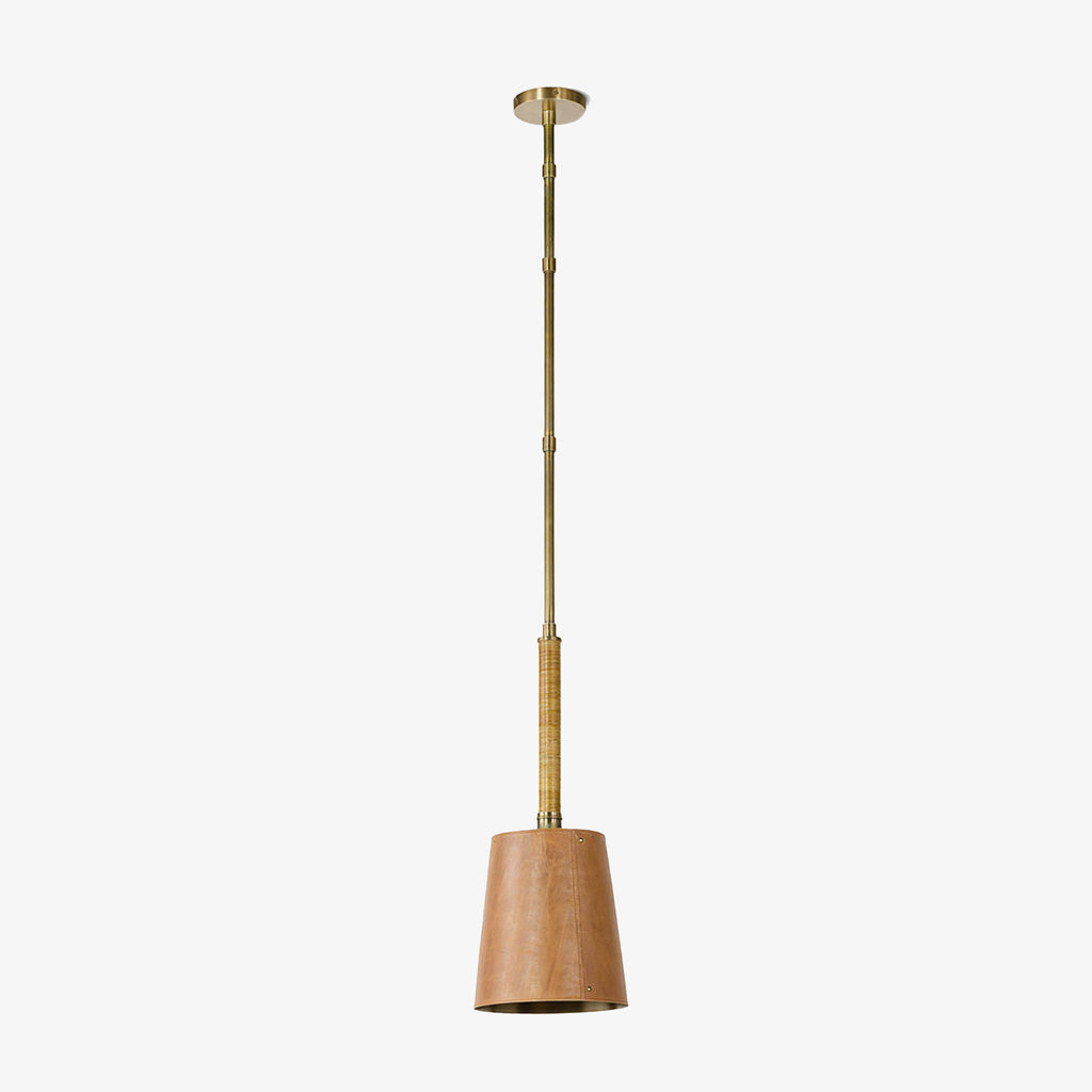 Palecek Hendrick Pendant with leather shade and rattan wrapped brass on a white background