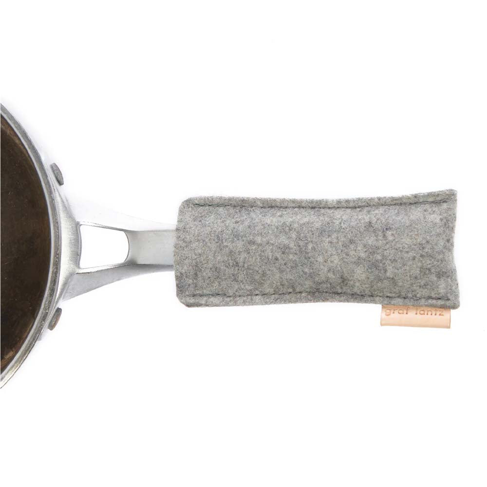 Graf Lantz granite felt pan handle on pan a white background
