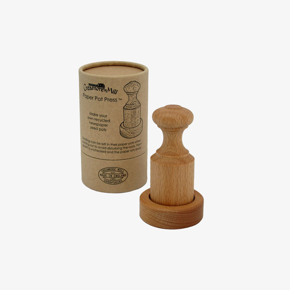 Wood plant pot press and craft tube box on a white background