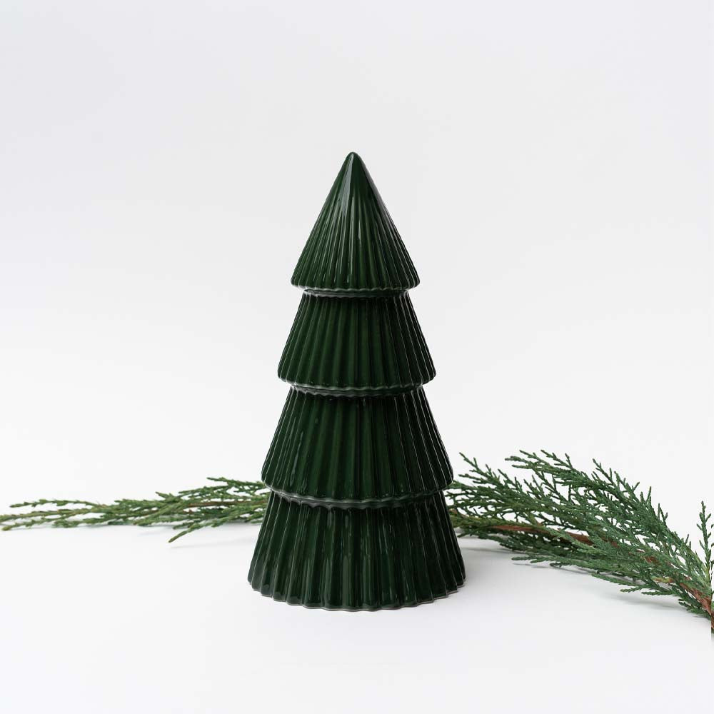 Medium Green ceramic decorative Christmas tree on white background