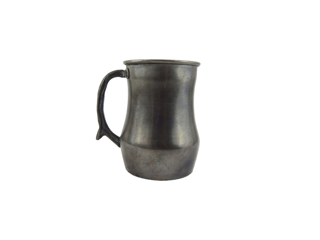Antique dark Pewter Mug on a white background