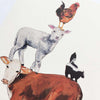 Close up of Greeting card with cow, lamp, rooster and skunk on a white background