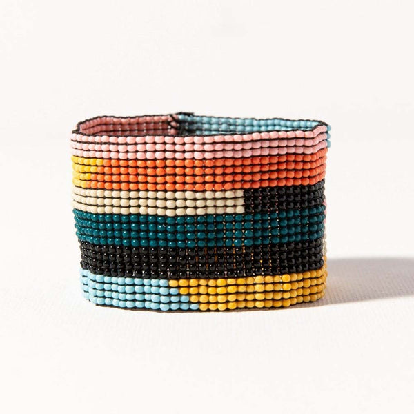 INK + ALLOY Pink Peacock Yellow Horizontal Stripe Stretch Bracelet on a white background