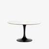 Four hands brand Powell dining table with black tulip base and white marble top