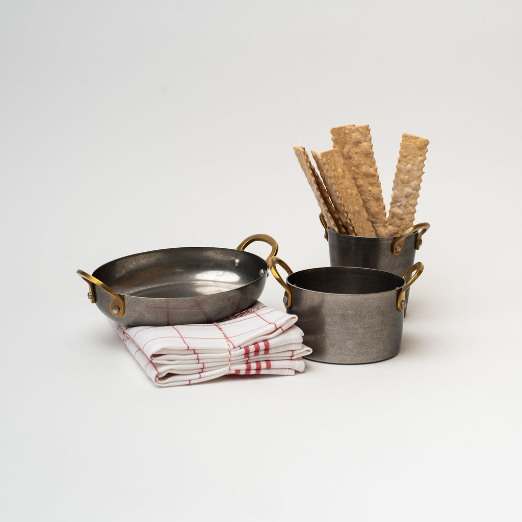 Nicolas Vahé brand metal presentation pots with brass handles on a white background