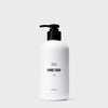 white hand soap bottle with black pump on a white background
