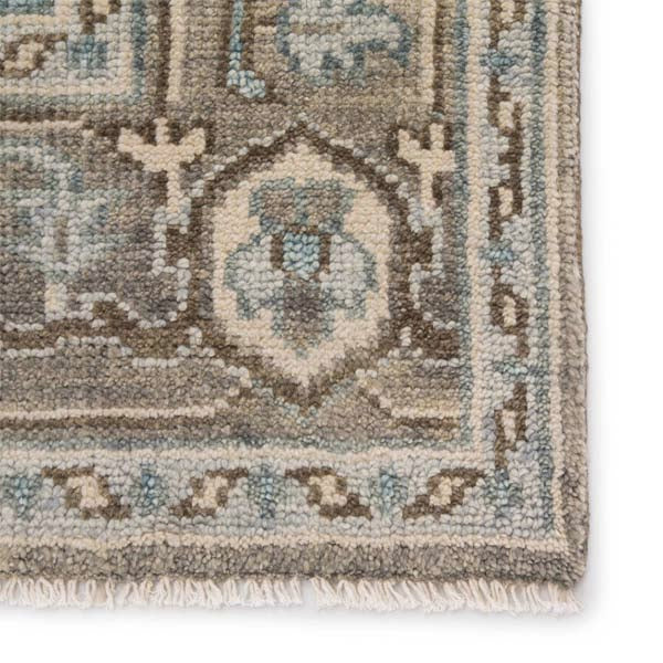 Close up of Jaipur living Salinas rug with center medallion and pop of sky blue