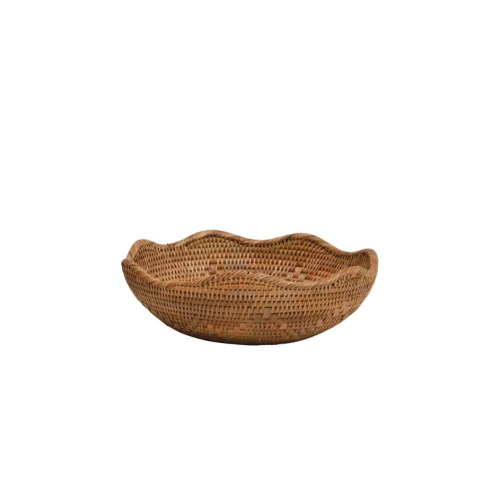 Small hand woven rattan nesting bowls with wavy lip by Bloomingville
