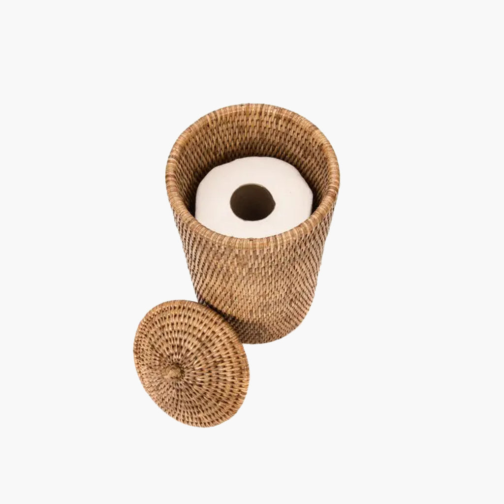 Rattan toilet paper holder with lid on a white background viewed from above