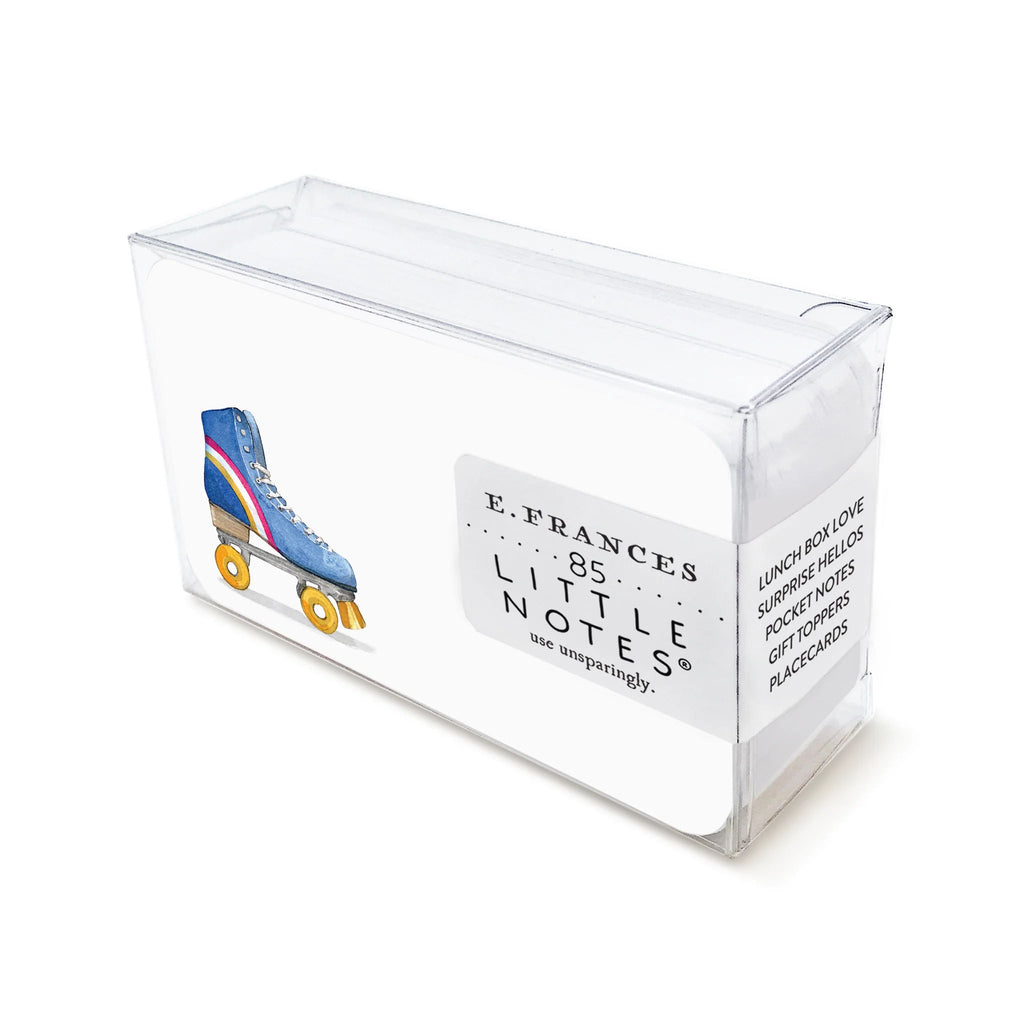 E francés brand little note cards with blue roller skate in clear box on a white background