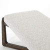 White upholstered 'Roscoe' bench with cross brace wood frame  by four hands furniture on a white background