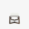 White upholstered 'Roscoe' bench with cross brace wood frame  by four hands furniture on a white background