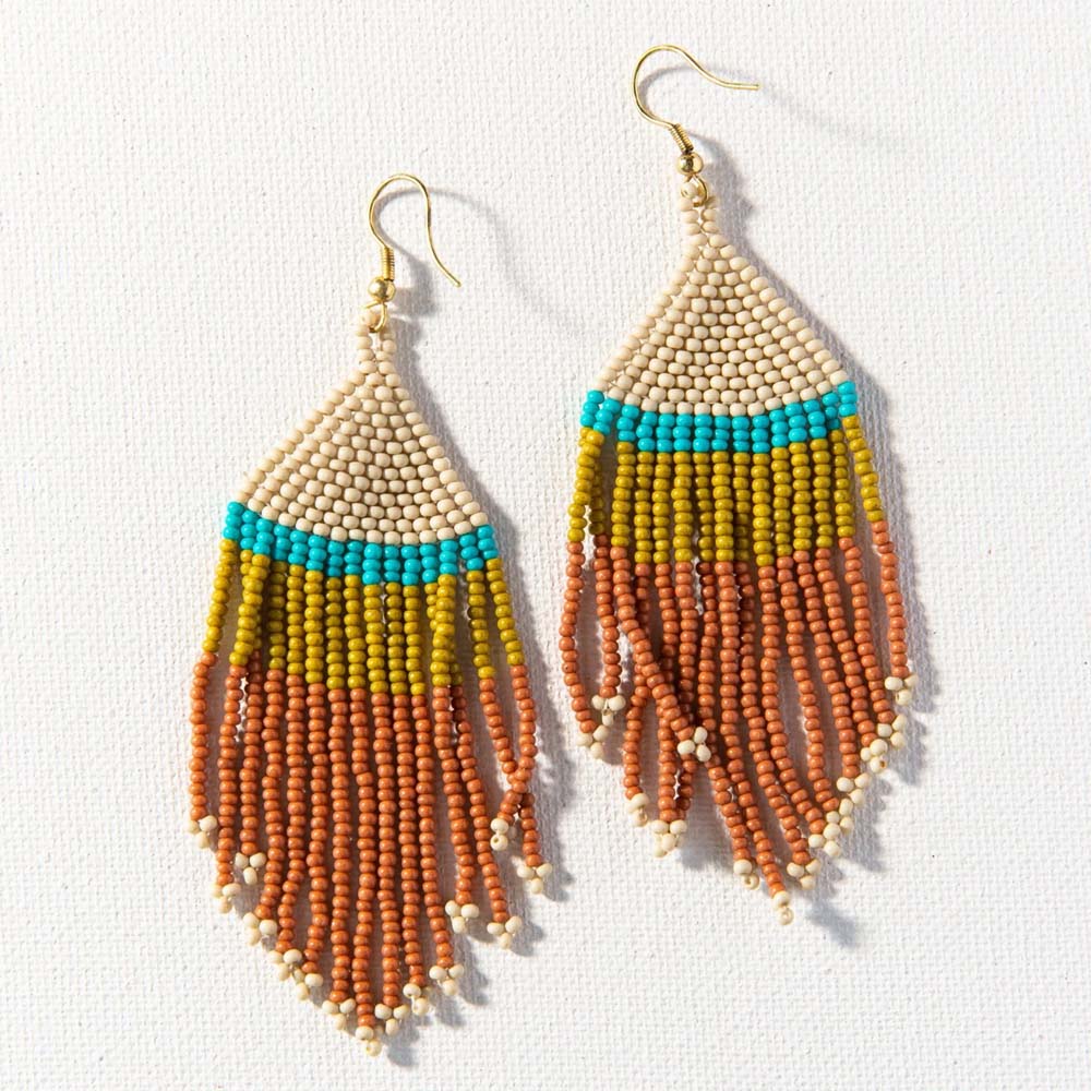 Ink + Alloy brand rust ivory and citron fridge earring on a white background