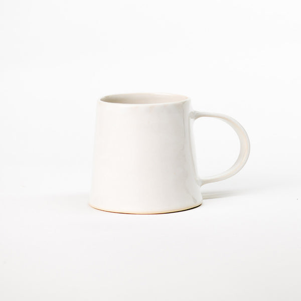 Stephanie Grace Ceramics white barrel mug on a white background