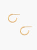 Able brand Celine Huggie Hoops in 14 carat gold fill on a white background