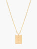 14k gold fill necklace with "hope" engraving on a white background